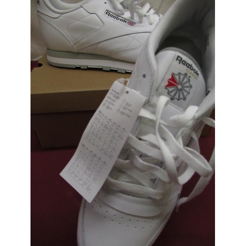 274 - Boxed as new Reebok Classic white leather trainers, size 11.5