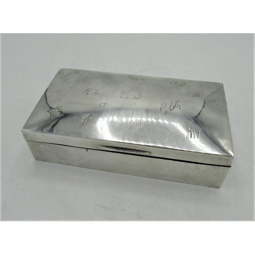 92 - Geo.V hallmarked sterling silver cigarette box with fourteen engraved initials to lid by Charles S G... 