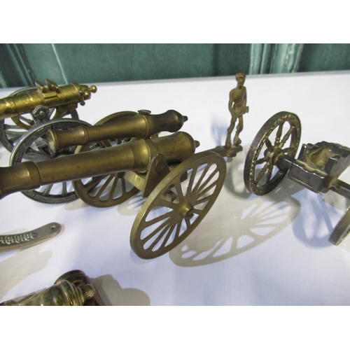 286 - Eight various model cannons, Gatling gun, etc