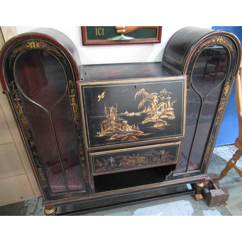 745 - C20th Chinoiserie black and gilt lacquer side cabinet, two arched glazed cupboards with central fall... 