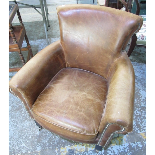 746 - C20th brown leather tub chair, H87cm