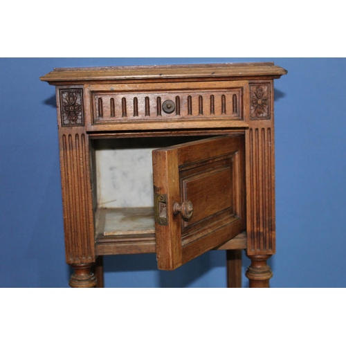 742 - Early C20th marble top French Empire style bedside cabinet, panelled door and frieze drawer on flute... 