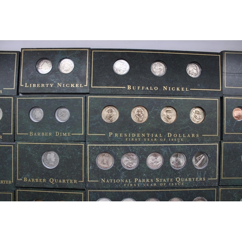 613 - Danbury Mint Collectible Coins of America coin collection, approx. 70 US coins of varying ages capsu... 