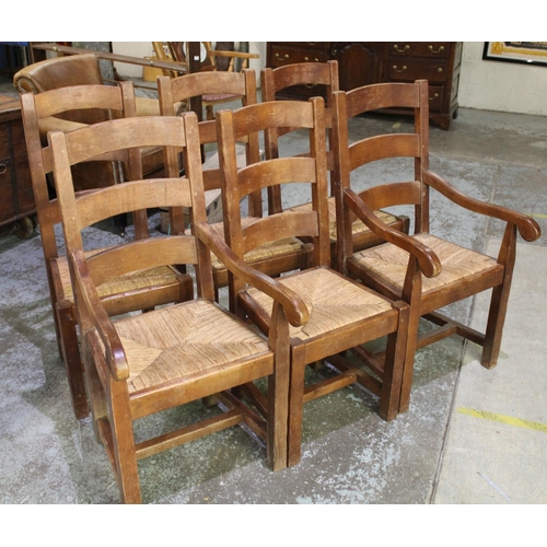 740 - Set of six C20th solid oak ladder back dining chairs with rush seats including two matching carvers ... 