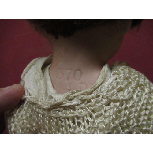 383 - Armand Marseille stamped A 370 AM-I-DEP, wearing brown wig, crochet dress, H52cm