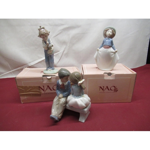 391 - Boxed Nao figure, young girl holding her skirt, numbered 1290, H16.5cm, boxed Nao figure 