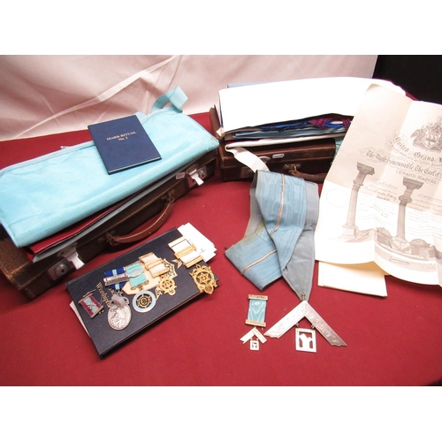 399 - Silver past masters jewel London 1910, and other associated masonic craft regalia, contained in two ... 