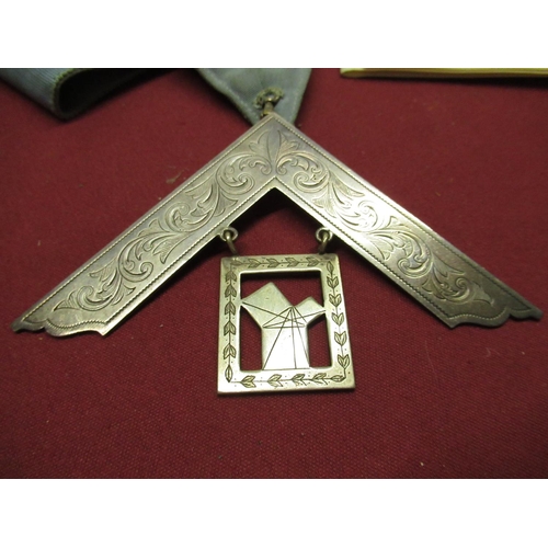 399 - Silver past masters jewel London 1910, and other associated masonic craft regalia, contained in two ... 