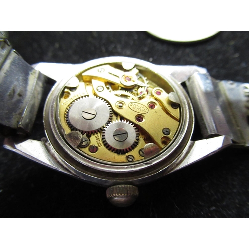 462 - Leonidas military style hand wound wristwatch, with silvered dial, Arabic numerals at the 12, 3 and ... 