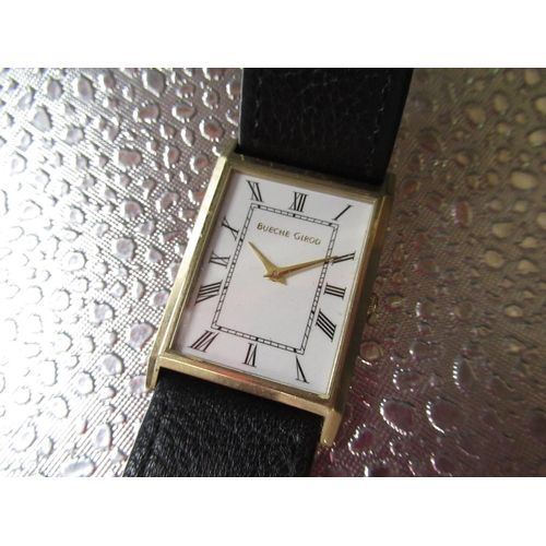 465 - Bueche Girod 9ct gold cased quartz wristwatch, white coloured dial with Arabic numerals and rail tra... 