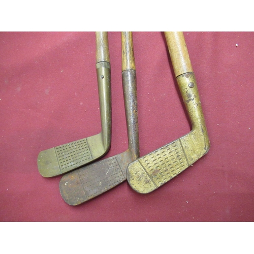 556 - Jennie Bond Collection - Early C20th A H Steer special 10 putter and two other similar golf clubs (3... 