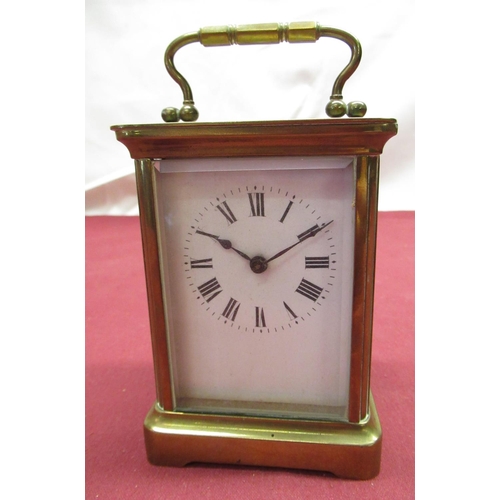 353 - Early C20th French brass cased carriage clock time piece with white enamel dial, bevel edged glass p... 