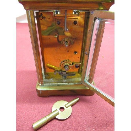 353 - Early C20th French brass cased carriage clock time piece with white enamel dial, bevel edged glass p... 