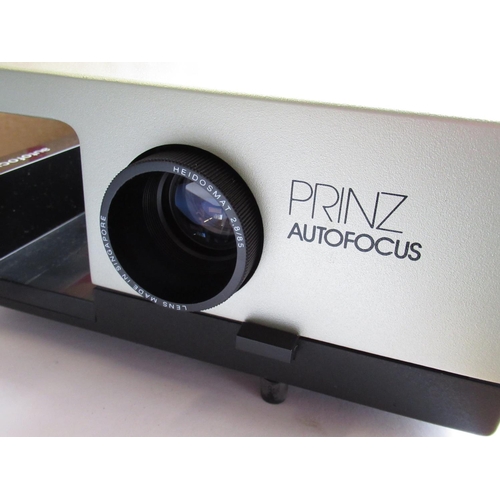 111 - Owain Wyn Evans Collection - Chinon dual 8mm projector with box, a Prinz autofocus 35mm slide projec... 