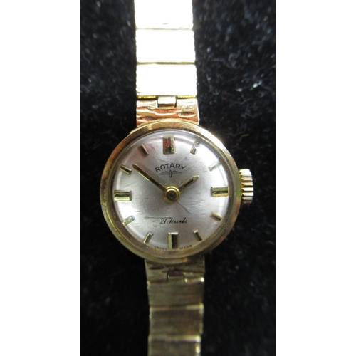 467 - Ladies Rotary 9ct gold hand wound cocktail watch, signed silvered dial with applied hour markers, co... 