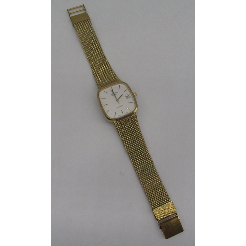 1070 - Rotary quartz wristwatch with date, signed champagne covered dial with baton hour markers, gold plat... 