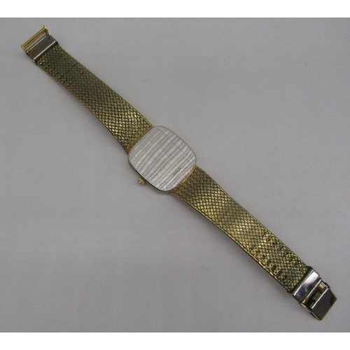 1070 - Rotary quartz wristwatch with date, signed champagne covered dial with baton hour markers, gold plat... 