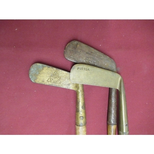 556 - Jennie Bond Collection - Early C20th A H Steer special 10 putter and two other similar golf clubs (3... 