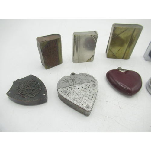 753 - Aluminium heart shaped lighter marked Egypt, plastic heart shaped lighter, St. Christopher circular ... 