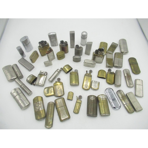 765 - Collection of early 20th century brass and silver plated lighters (40)