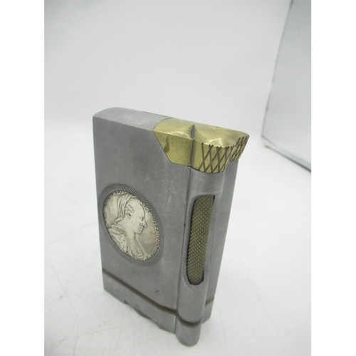 771 - Large metal lighter with Maria Theresa coin encased and a circular Maria Theresa coin lighter (2)