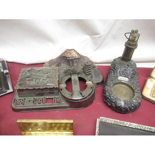 802 - Japanese design ash tray, lighthouse ashtray, 5 lighter and cigarette case sets and a partial lighte... 