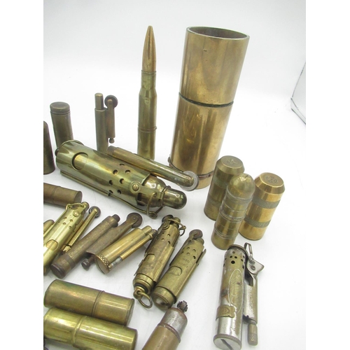 704 - Collection of Trench Art bullet and shell lighter, with some reproduction pieces(35)