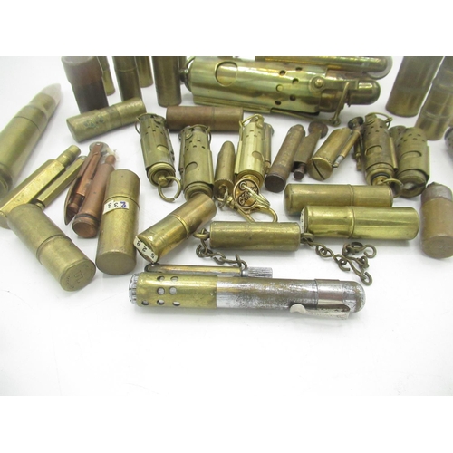 704 - Collection of Trench Art bullet and shell lighter, with some reproduction pieces(35)