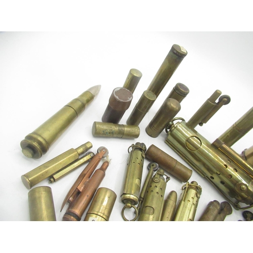 704 - Collection of Trench Art bullet and shell lighter, with some reproduction pieces(35)