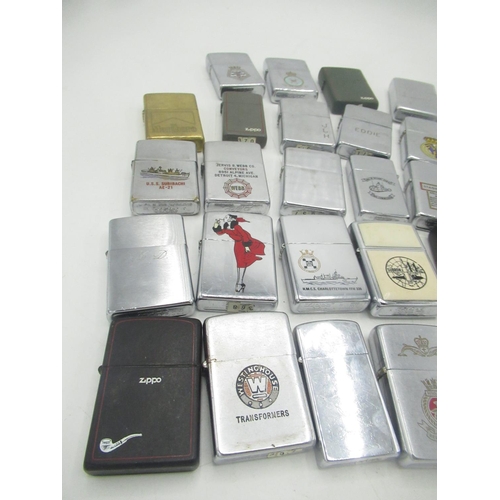 711 - Collection of Zippo lighters inc. Marlboro, BMW, Real Madrid, U.S.M.A. West Point, royal air force r... 