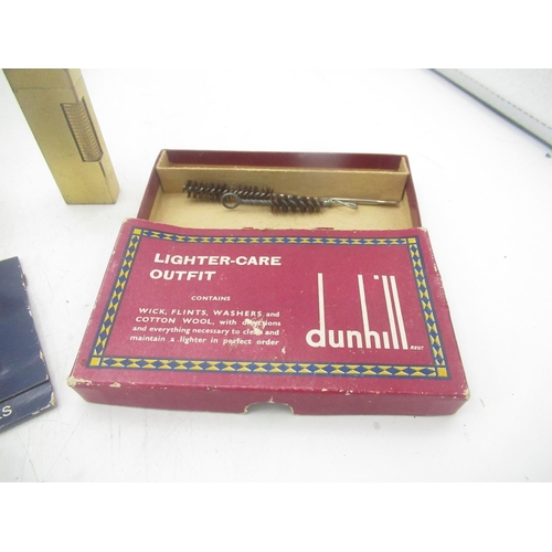 728 - Dunhill 70 lighter, 2 Dunhill Rollagass lighters, incomplete Dunhill lighter care outfit and a pack ... 