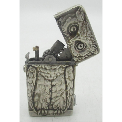 732 - Continental silver lighter, Owl design, stamped 800