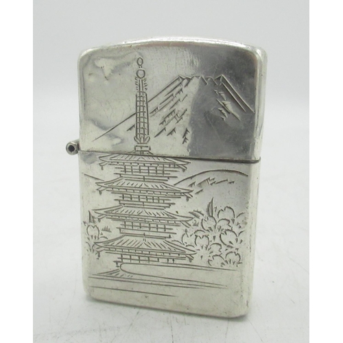 734 - Silver lighter with Japanese design, marked 