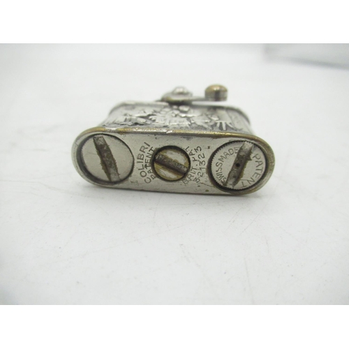 740 - Colibri Original silver 850 banded lighter of a Dutch kitchen scene