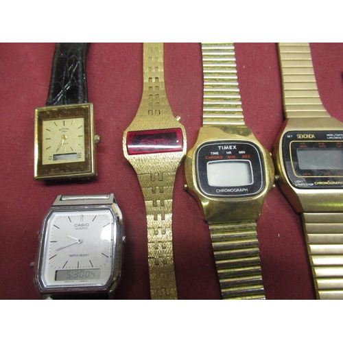 667 - 1970's ladies LED wristwatch in brushed gold plated case with integral bracelet, 1970's Timex LCD qu... 