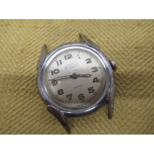 681 - Buren Grand Prix silver cushion cased hand wound wristwatch, signed two toned silvered dial with ske... 