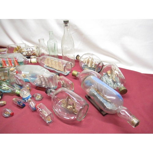 940 - Collection of glass bottles and Ships in bottles, in various sizes