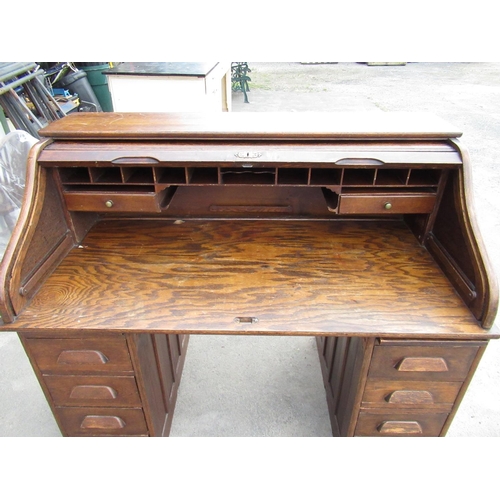 943 - 20th century serpentine roll top desk, 137cm x 115.5cm x 75.5cm