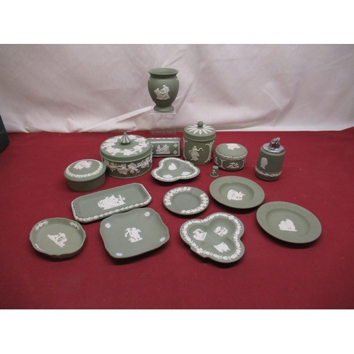 1115 - Collection of Wedgwood green Jasperware including lighter, trinket dishes, jars etc.