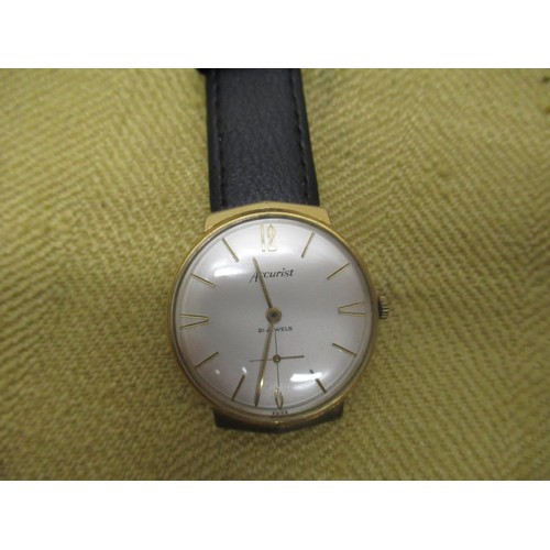 649 - Accurist 9ct gold cased hand wound wristwatch, silvered dial with applied Arabic and baton hour mark... 