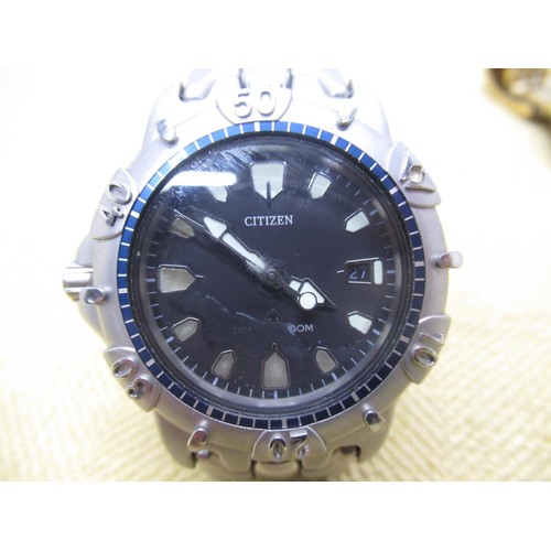 648 - Citizen Promaster left handed quartz divers watch with date, stainless steel case on stainless steel... 