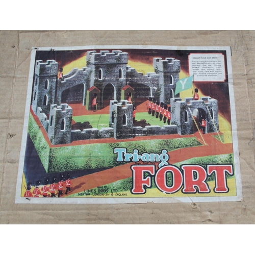 875 - Tri-ang Fort in original box, one section of wall missing, play worn condition