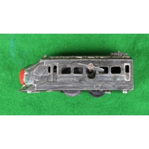 899 - Unusual and rare made in Japan clockwork train/tram with large red painted front nose