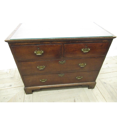 589 - Small oak chest of C19th two short and two long drawers on shaped bracket feet, W94cm D47cm H77cm