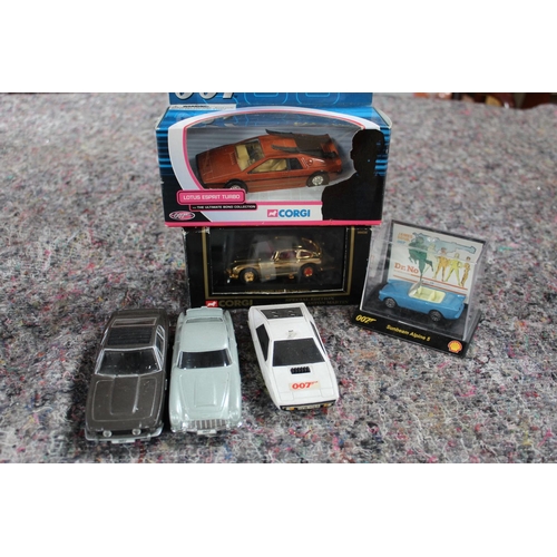 846 - Collection of play worn and also boxed James Bond cars  inc. Corgi Lotus Espirit, boxed Corgi specia... 