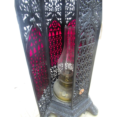 636 - French cast iron heater, hexagonal body with colour panels, hinged door and brass burner, the remova... 