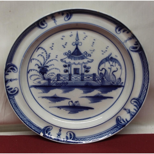 593 - Early C19th English circular plate, painted with Chinese Pagoda in a garden, D23cm (A/F)