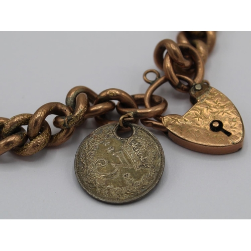 1022 - 9ct hollow gold curb link bracelet with heart padlock clasp and 1887 3d, stamped 9 375, 13.5g
