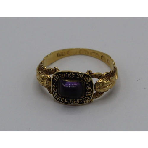 1028 - 18ct yellow gold memorial ring set with cabochon purple stone on snake band, engraved inside 