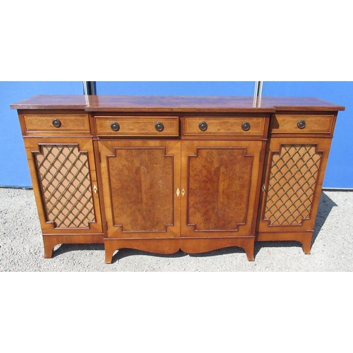 1305 - Regency style yew breakfront side cabinet, reeded top and three drawers above two panelled and two b... 